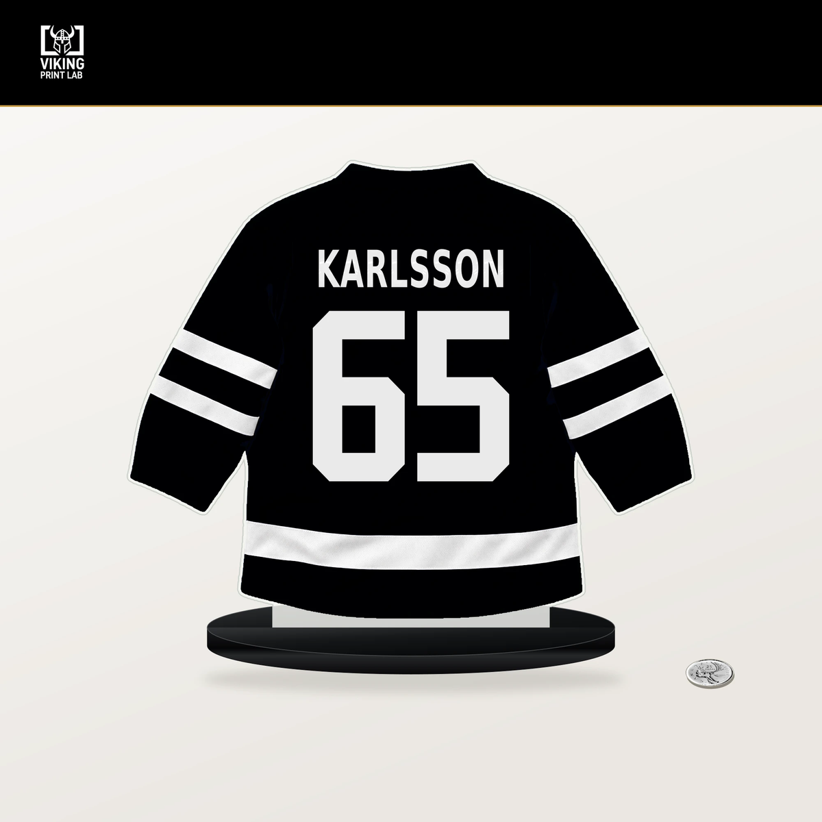 Erik Karlsson number 65 Pittsburgh Penguins jersey stand with included black base.