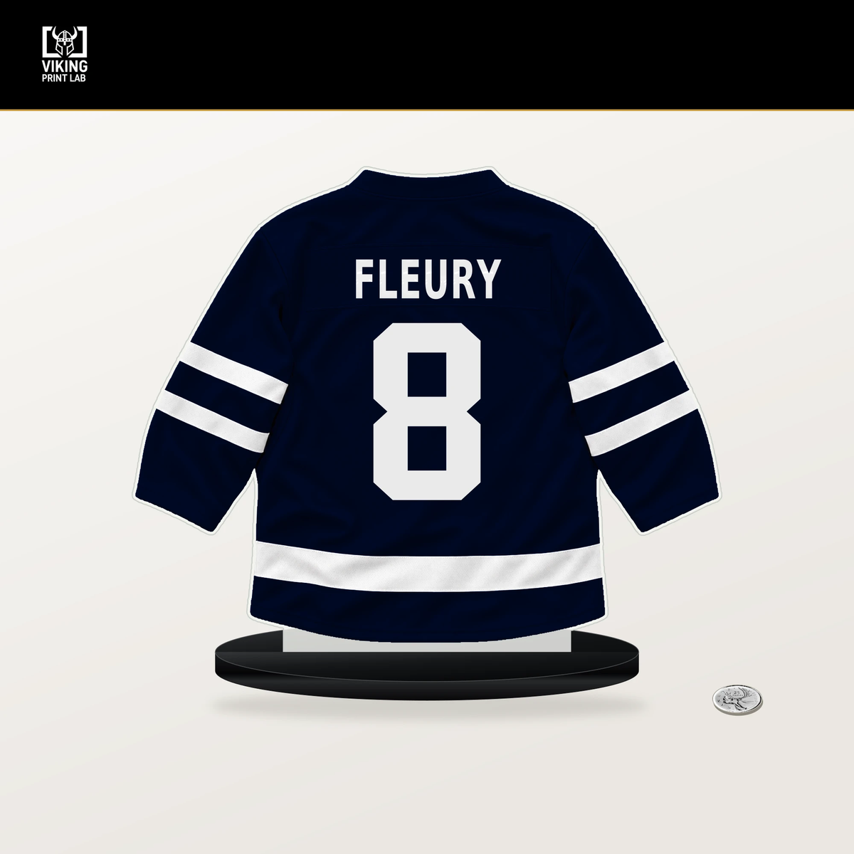 Cale Fleury number 8 Seattle Kraken jersey stand with included black base.