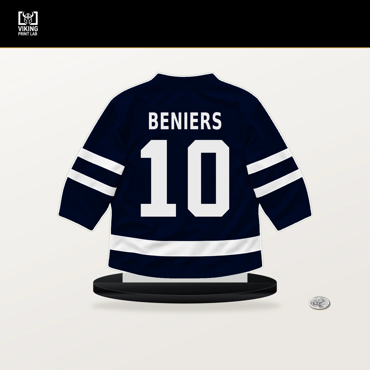 Matty Beniers number 10 Seattle Kraken jersey stand with included black base.