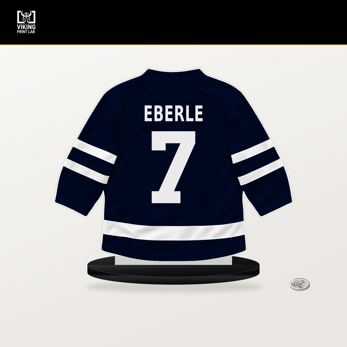 Jordan Eberle number 7 Seattle Kraken jersey stand with included black base.