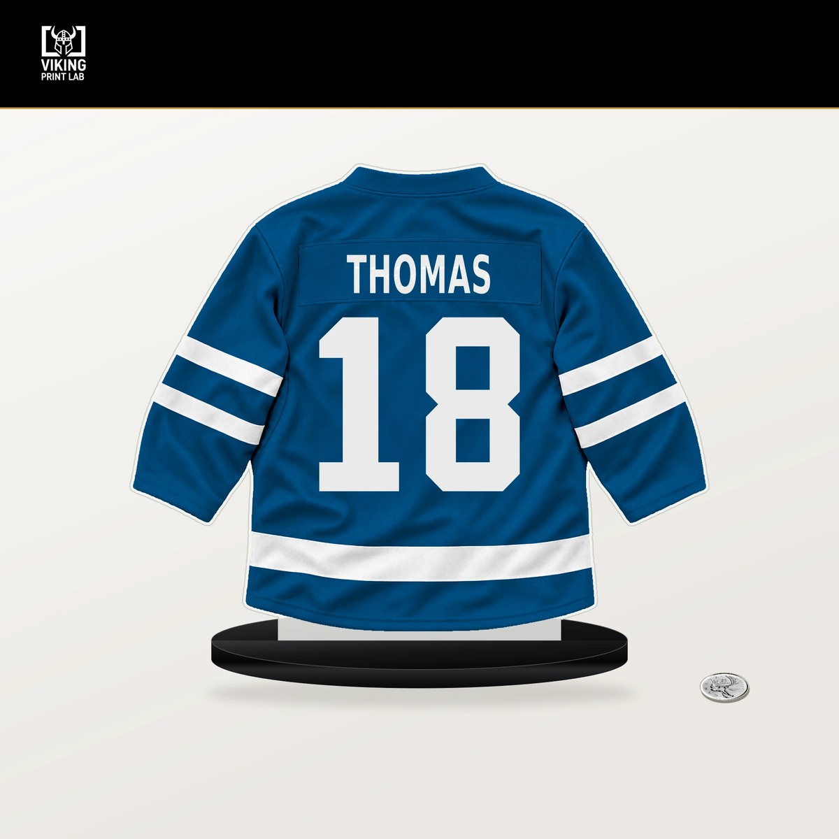 Robert Thomas number 18 St. Louis Blues jersey stand with included black base.