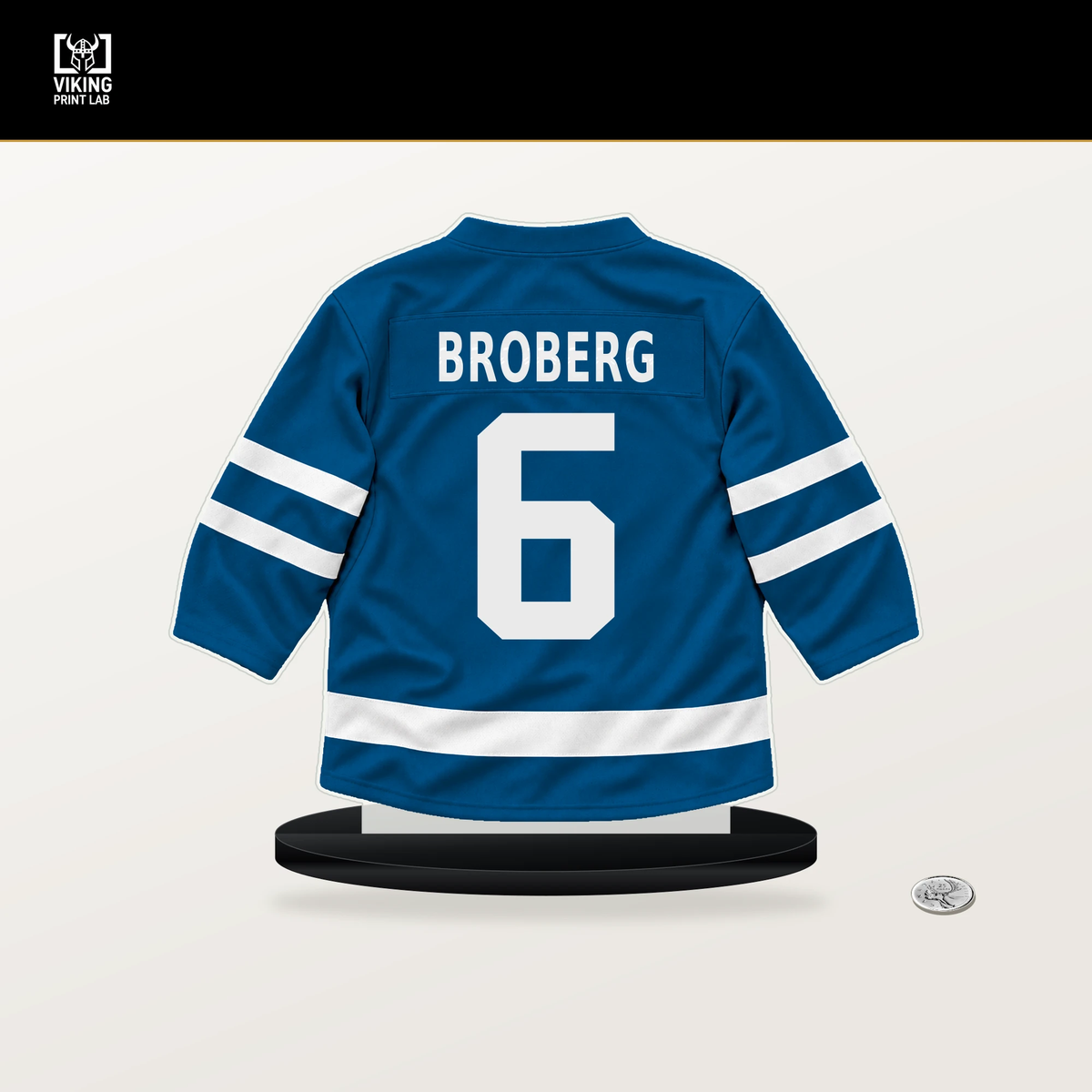 Philip Broberg number 6 St. Louis Blues jersey stand with included black base.