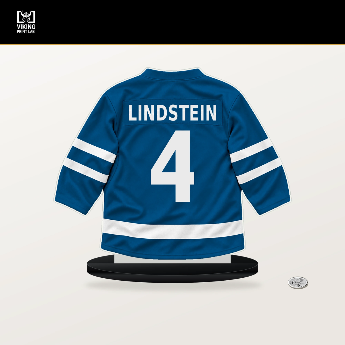 Theo Lindstein number 4 St. Louis Blues jersey stand with included black base.