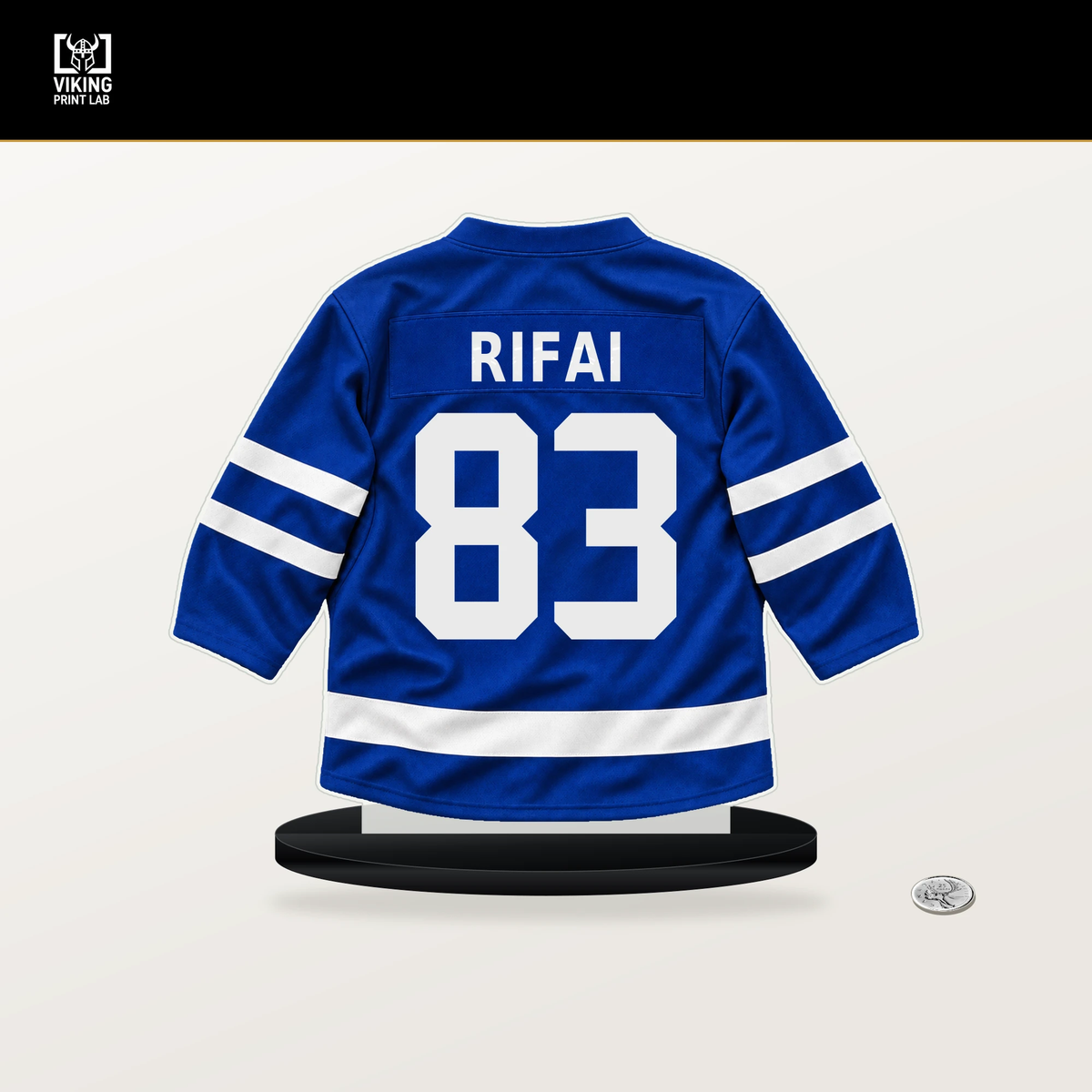 Marshall Rifai number 83 Toronto Maple Leafs jersey stand with included black base.