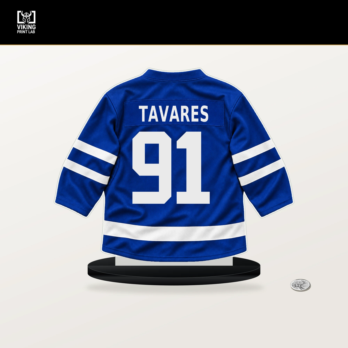 John Tavares number 91 Toronto Maple Leafs jersey stand with included black base.