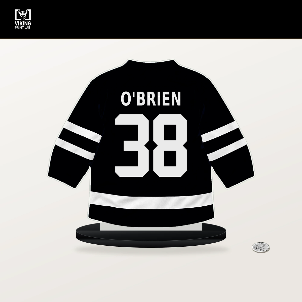 Liam O'Brien number 38 Utah Mammoth jersey stand with included black base.
