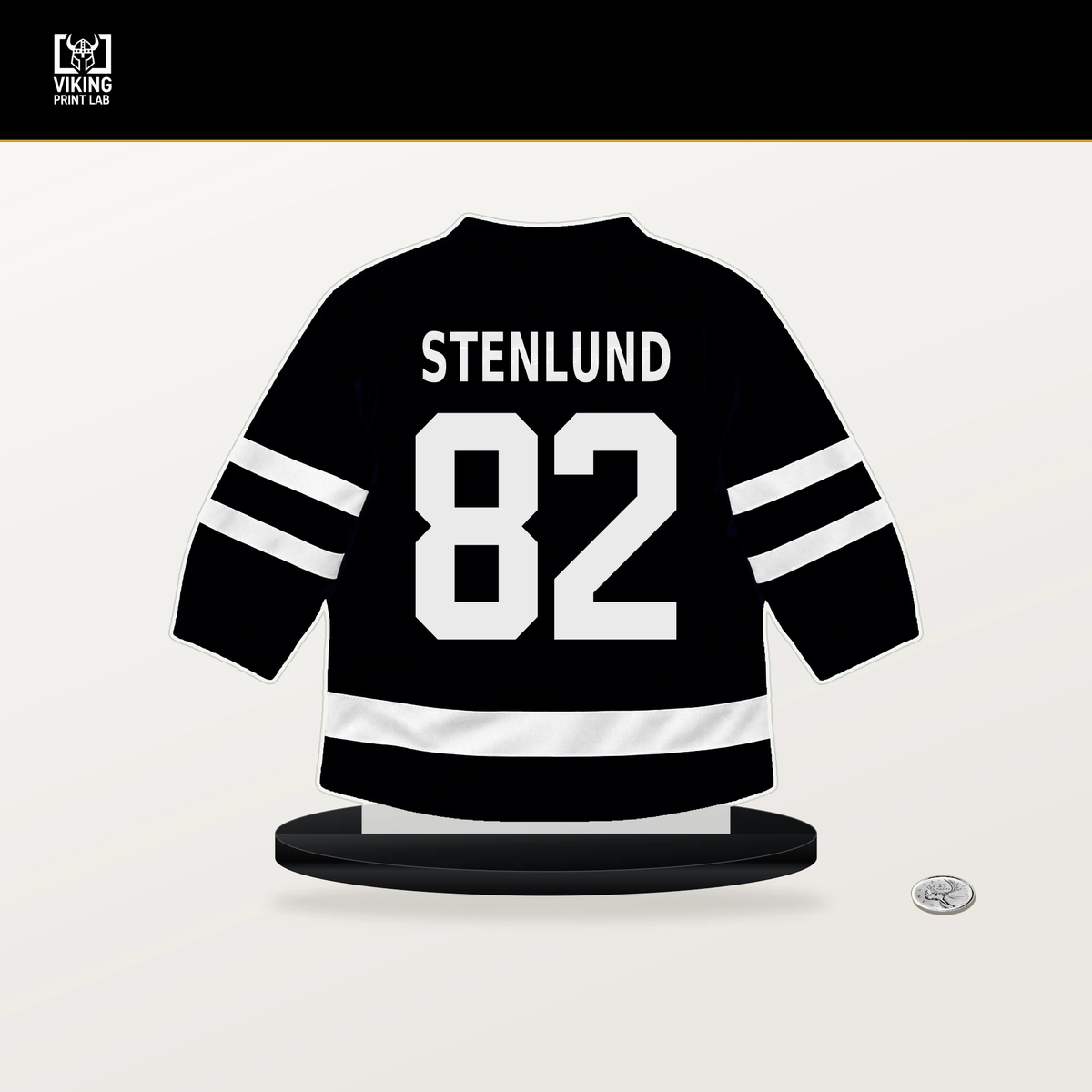 Kevin Stenlund number 82 Utah Mammoth jersey stand with included black base.