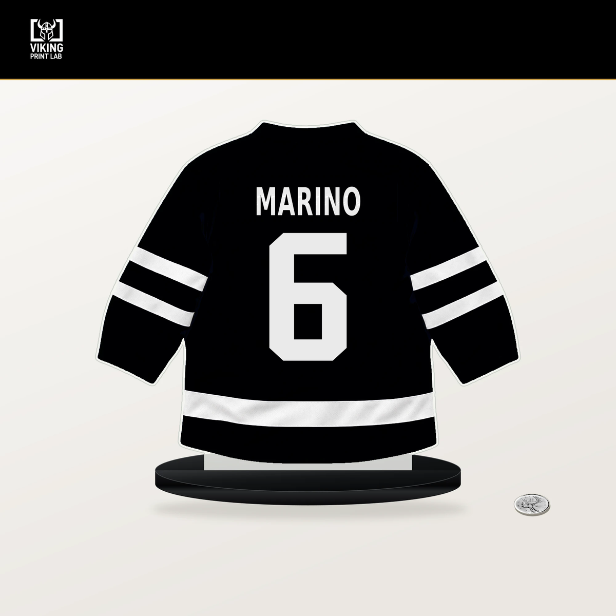 John Marino number 6 Utah Mammoth jersey stand with included black base.