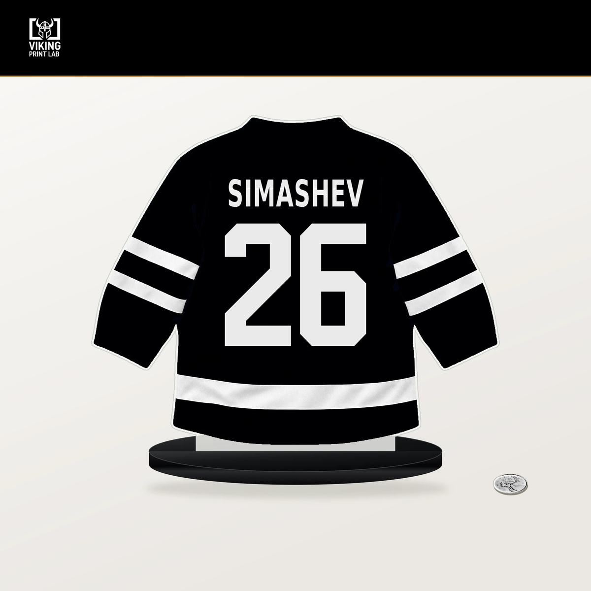 Dmitri Simashev number 26 Utah Mammoth jersey stand with included black base.