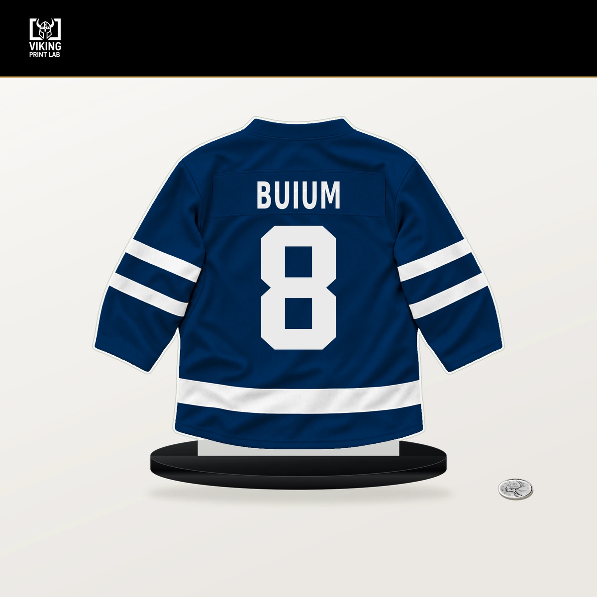 Zeev Buium number 8 Vancouver Canucks jersey stand with included black base.