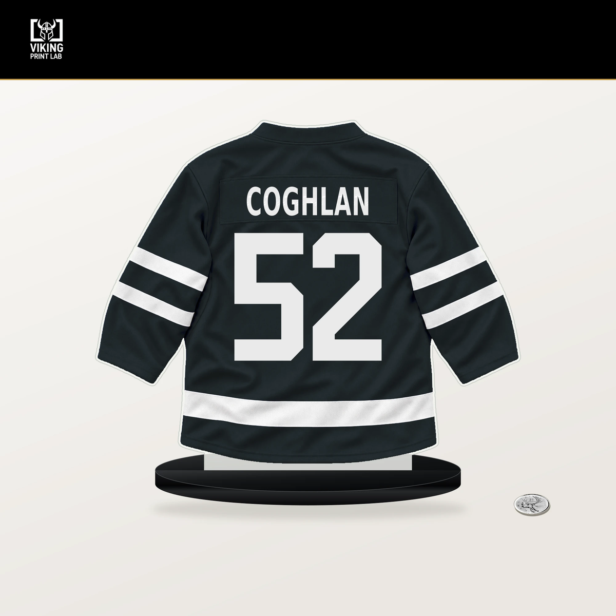 Dylan Coghlan number 52 Vegas Golden Knights jersey stand with included black base.