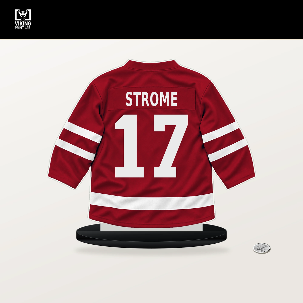 Dylan Strome number 17 Washington Capitals jersey stand with included black base.