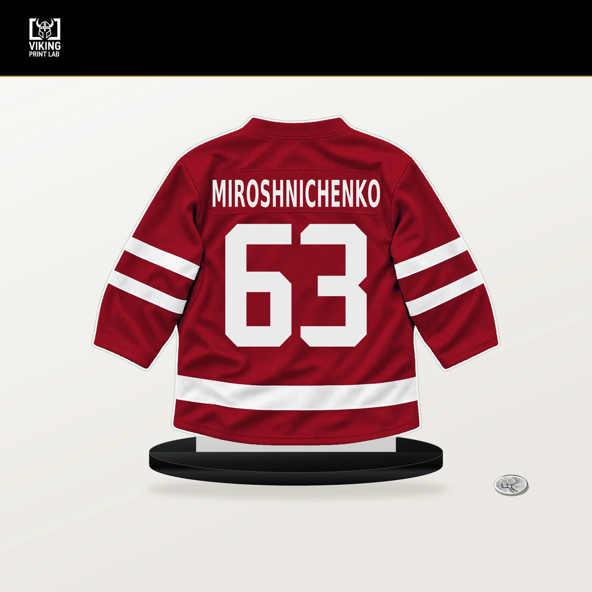 Ivan Miroshnichenko number 63 Washington Capitals jersey stand with included black base.