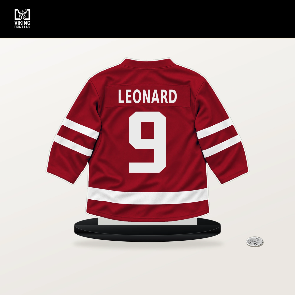 Ryan Leonard number 9 Washington Capitals jersey stand with included black base.