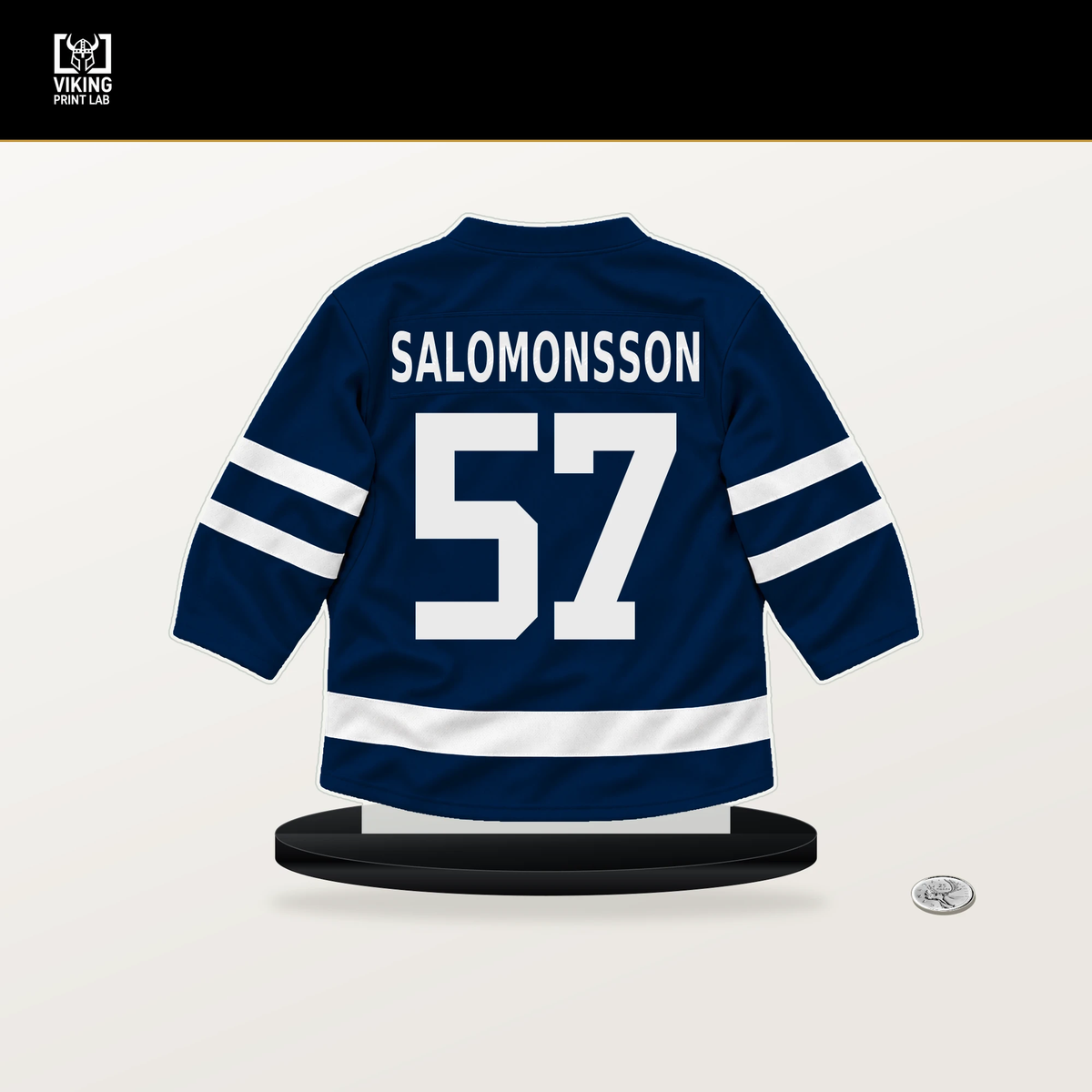 Elias Salomonsson number 57 Winnipeg Jets jersey stand with included black base.