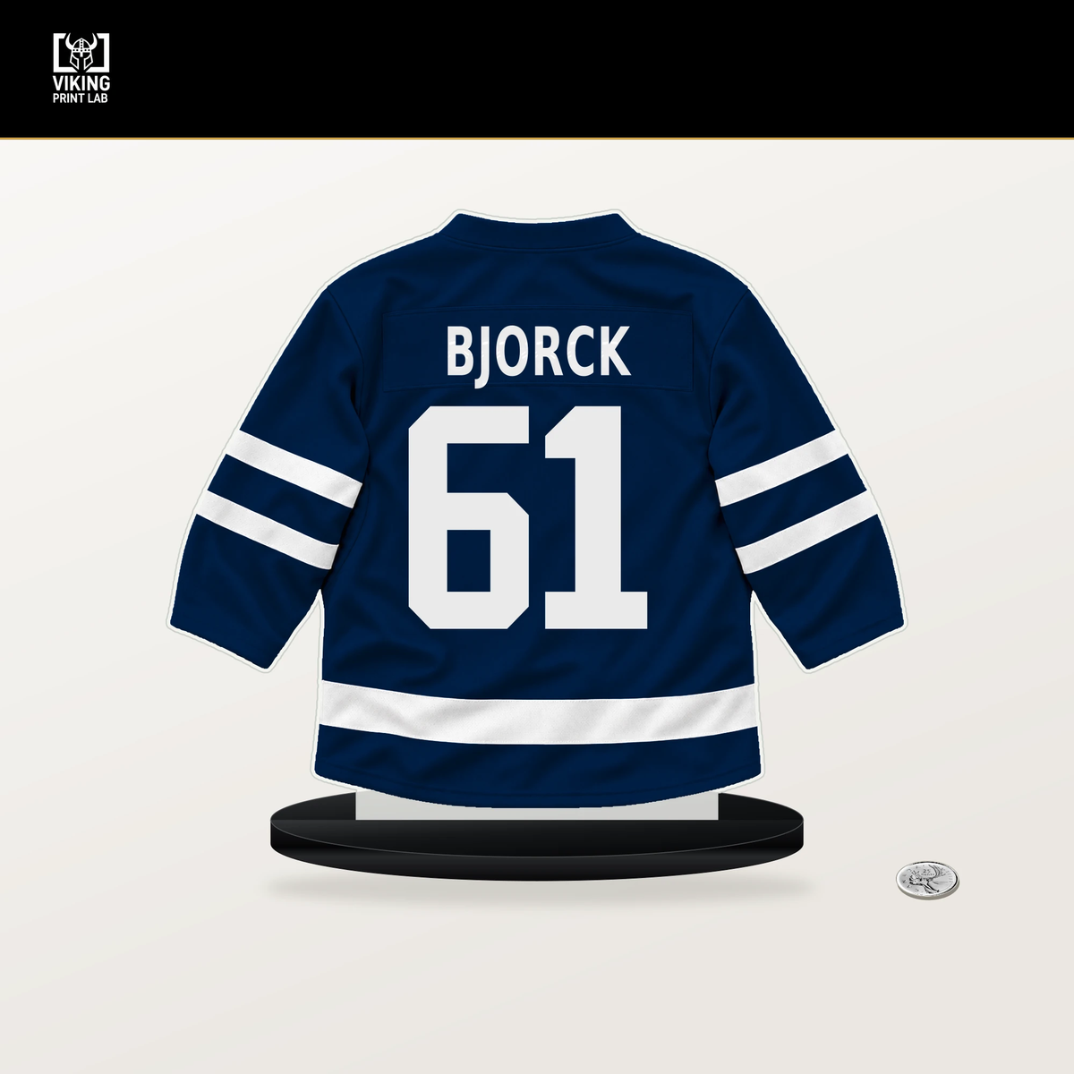 Viggo Bjorck number 61 Winnipeg Jets jersey stand with included black base.