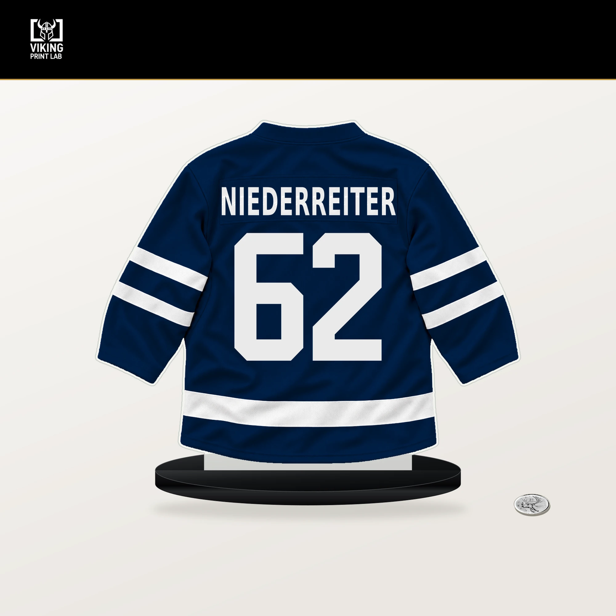 Nino Niederreiter number 62 Winnipeg Jets jersey stand with included black base.