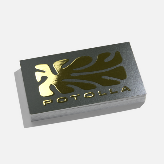 Gold raised foil business card example on dark matte stock;not a glitter finish example.
