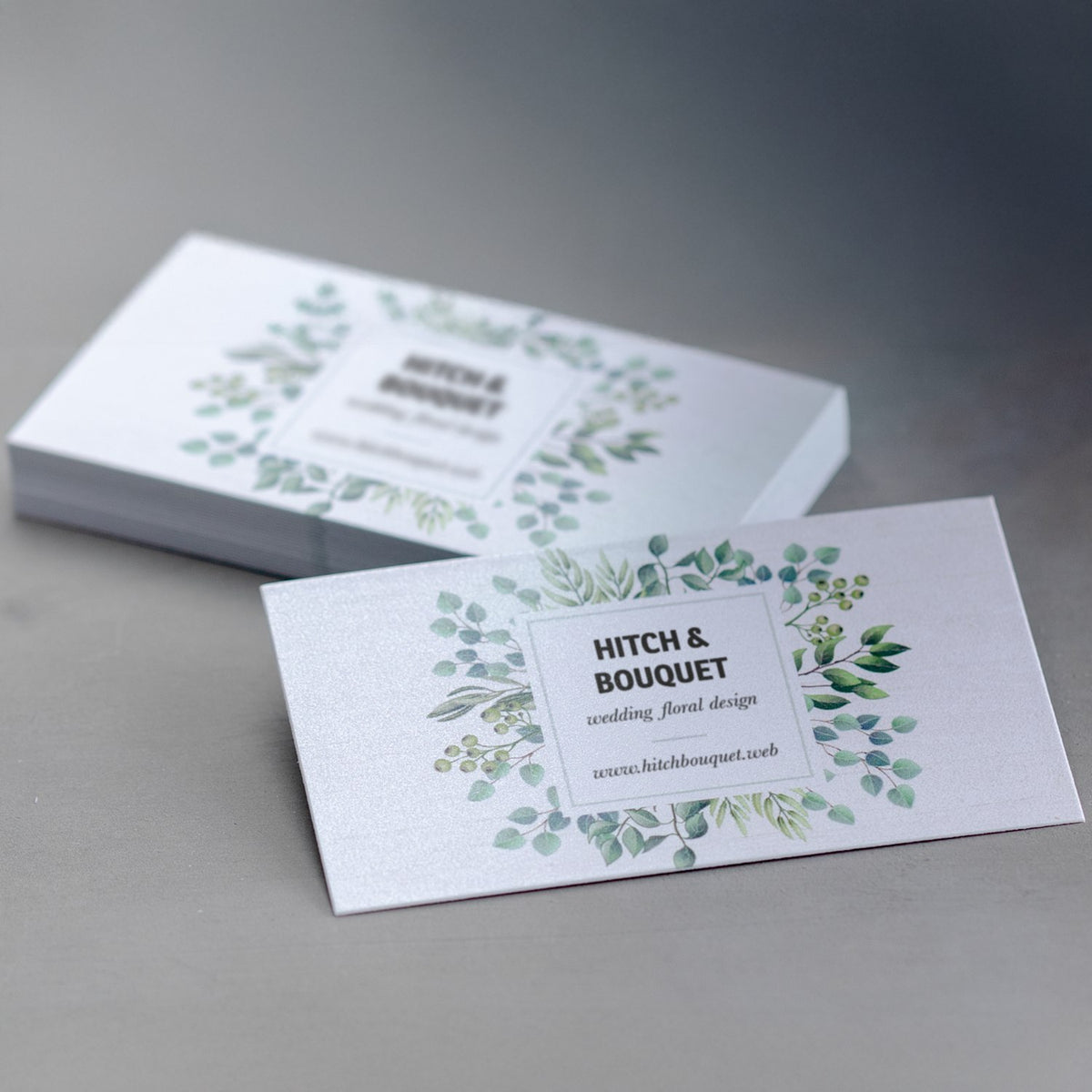 Printed pearl business cards with botanical sample artwork