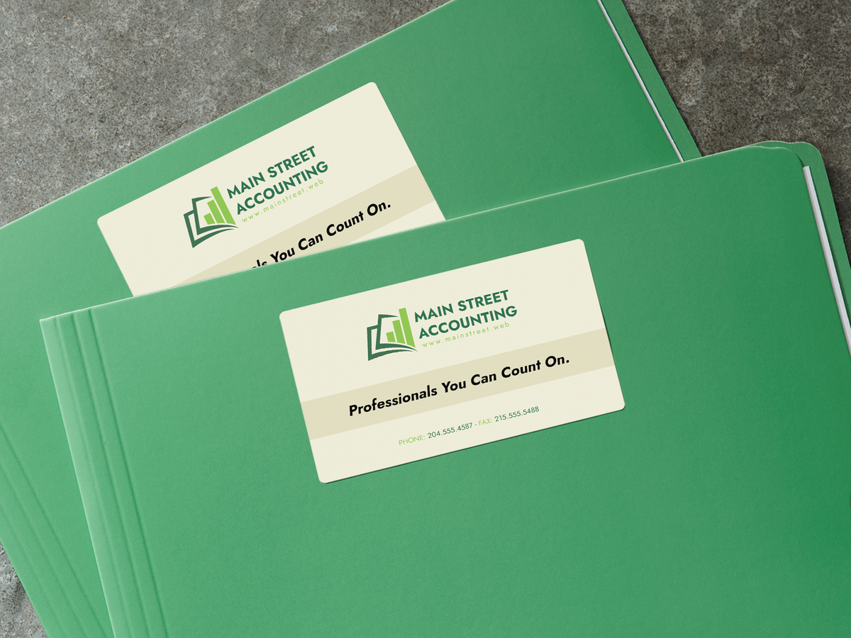 Business card stickers applied to presentation folders