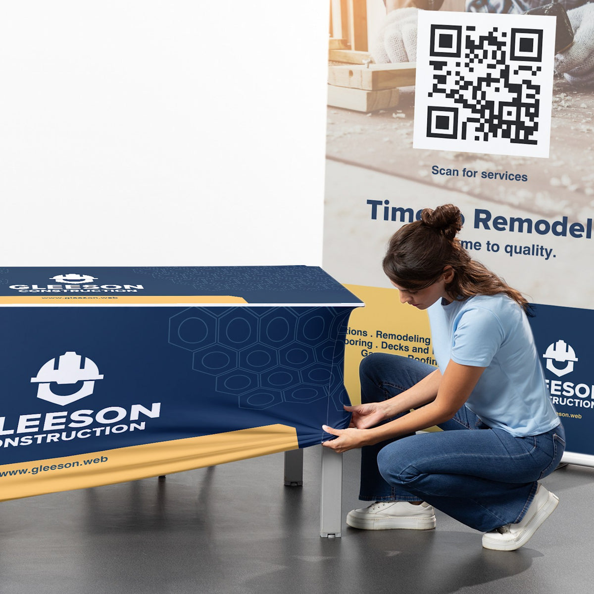 Fitting a custom stretch table cover over a folding table