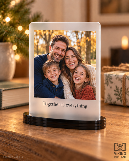 Everheld frosted acrylic family photo keepsake in a warm holiday setting.