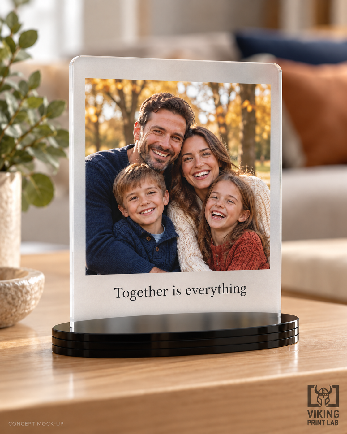 Everheld frosted acrylic family photo keepsake on a black oval stand, personalized with Together is everything.