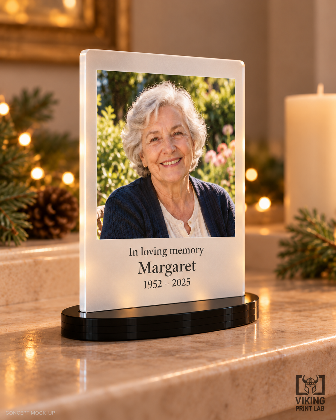 Everheld frosted acrylic Margaret memorial keepsake with warm holiday lights and evergreen accents.