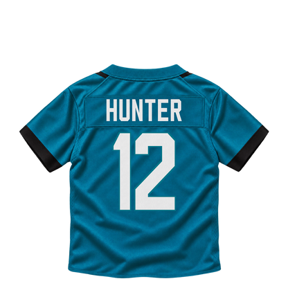Jacksonville Jaguars jersey keychain — Travis Hunter #12. Exact saved player artwork preview.