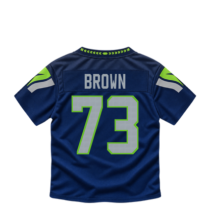 Seattle Seahawks jersey keychain — Logan Brown #73. Exact saved player artwork preview.