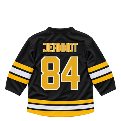 Boston Bruins jersey keychain — Tanner Jeannot #84. Exact saved player artwork preview.