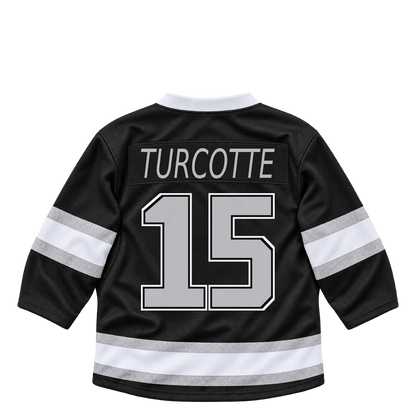 Los Angeles Kings jersey keychain — Alex Turcotte #15. Exact saved player artwork preview.