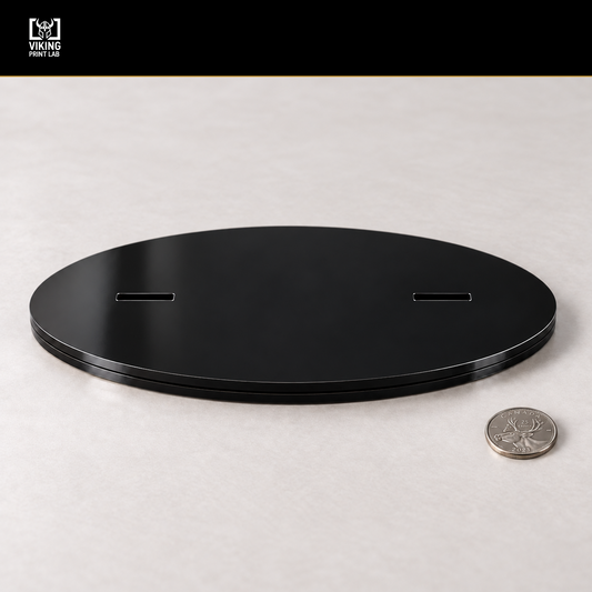 Black oval acrylic jersey display base with two mounting slots, the original Viking Print Lab logo and a Canadian quarter for scale.