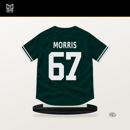 Kade Morris number 67 Athletics jersey stand with included black base.