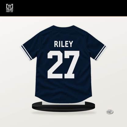 Austin Riley number 27 Atlanta Braves jersey stand with included black base.