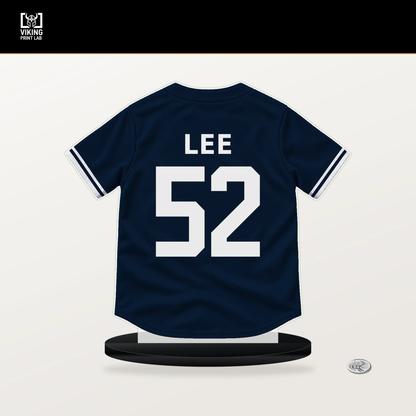 Dylan Lee number 52 Atlanta Braves jersey stand with included black base.