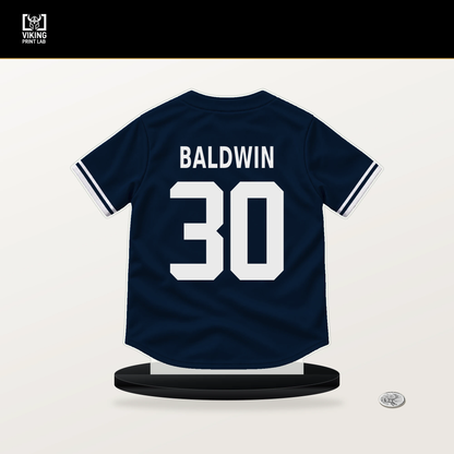 Drake Baldwin number 30 Atlanta Braves jersey stand with included black base.