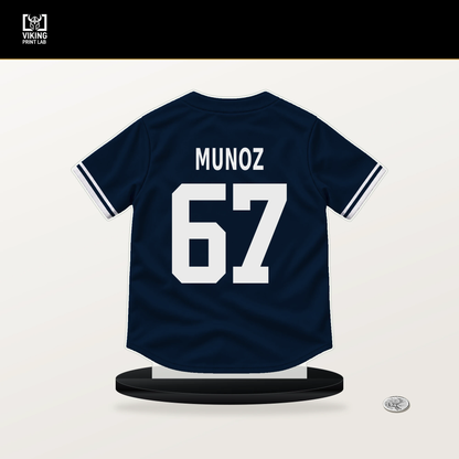 Rolddy Munoz number 67 Atlanta Braves jersey stand with included black base.
