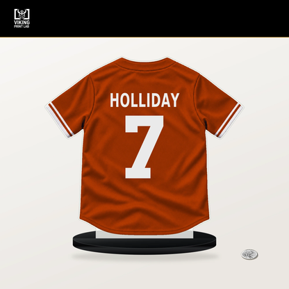 Jackson Holliday number 7 Baltimore Orioles jersey stand with included black base.