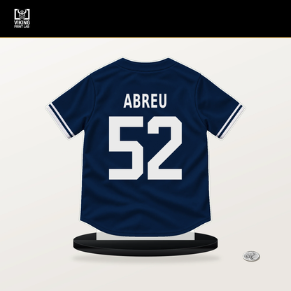 Wilyer Abreu number 52 Boston Red Sox jersey stand with included black base.