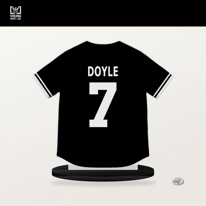 Brenton Doyle number 7 Chicago White Sox jersey stand with included black base.
