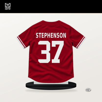 Tyler Stephenson number 37 Cincinnati Reds jersey stand with included black base.