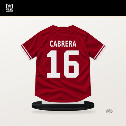 Oswaldo Cabrera number 16 Cincinnati Reds jersey stand with included black base.