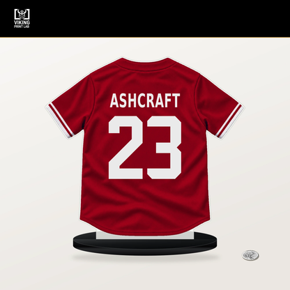 Graham Ashcraft number 23 Cincinnati Reds jersey stand with included black base.
