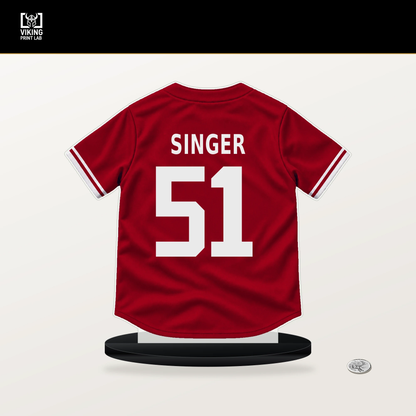 Brady Singer number 51 Cincinnati Reds jersey stand with included black base.