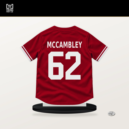 Zach McCambley number 62 Cincinnati Reds jersey stand with included black base.