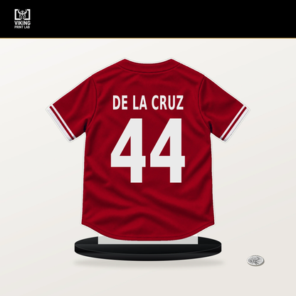 Elly De La Cruz number 44 Cincinnati Reds jersey stand with included black base.