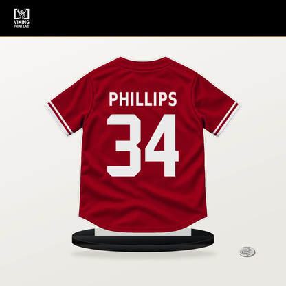 Connor Phillips number 34 Cincinnati Reds jersey stand with included black base.