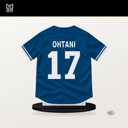 Shohei Ohtani number 17 Los Angeles Dodgers jersey stand with included black base.