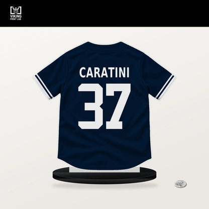 Victor Caratini number 37 Minnesota Twins jersey stand with included black base.